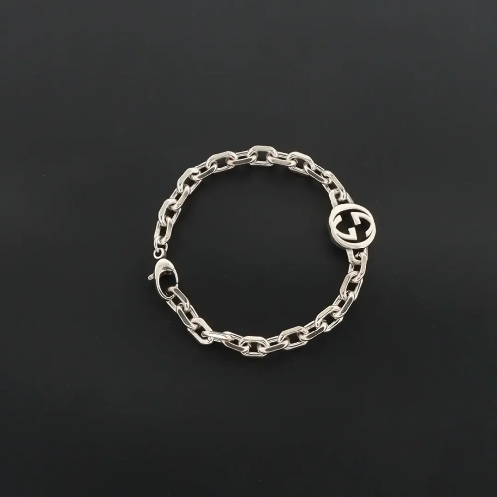 Armband mit ineinandergreifendem G silber