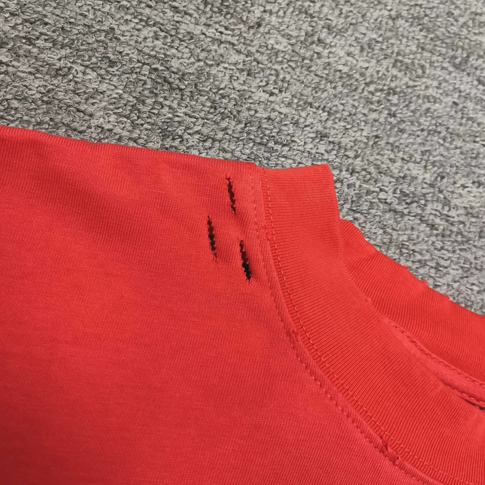 Balenciaga T-Shirt mit kurzen Ärmeln und gewaschenem Muster rot – Bild 7