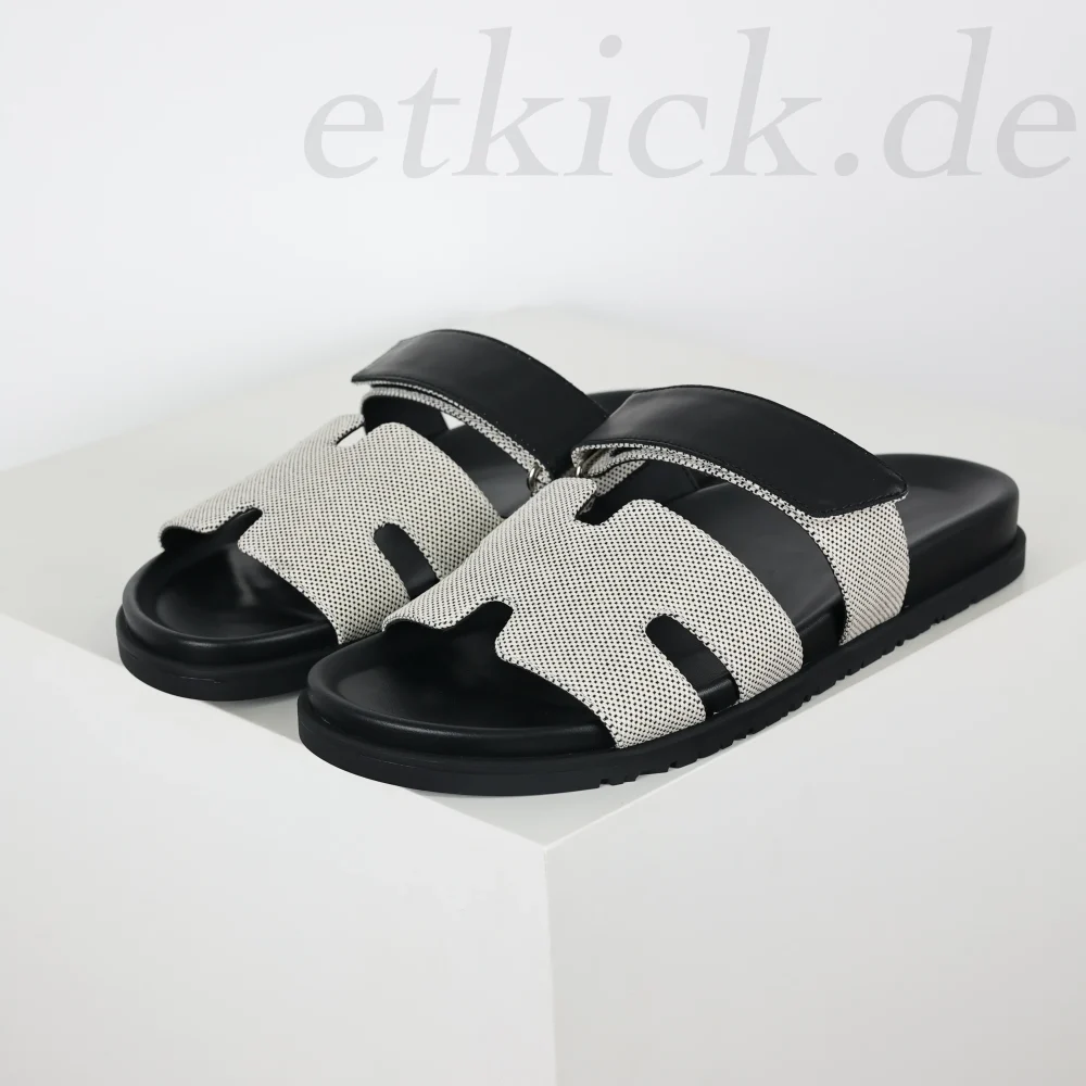 Flache Flip-Flops Sandalen Leder grau und schwarz
