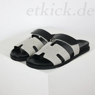 Flache Flip-Flops Sandalen Leder grau und schwarz