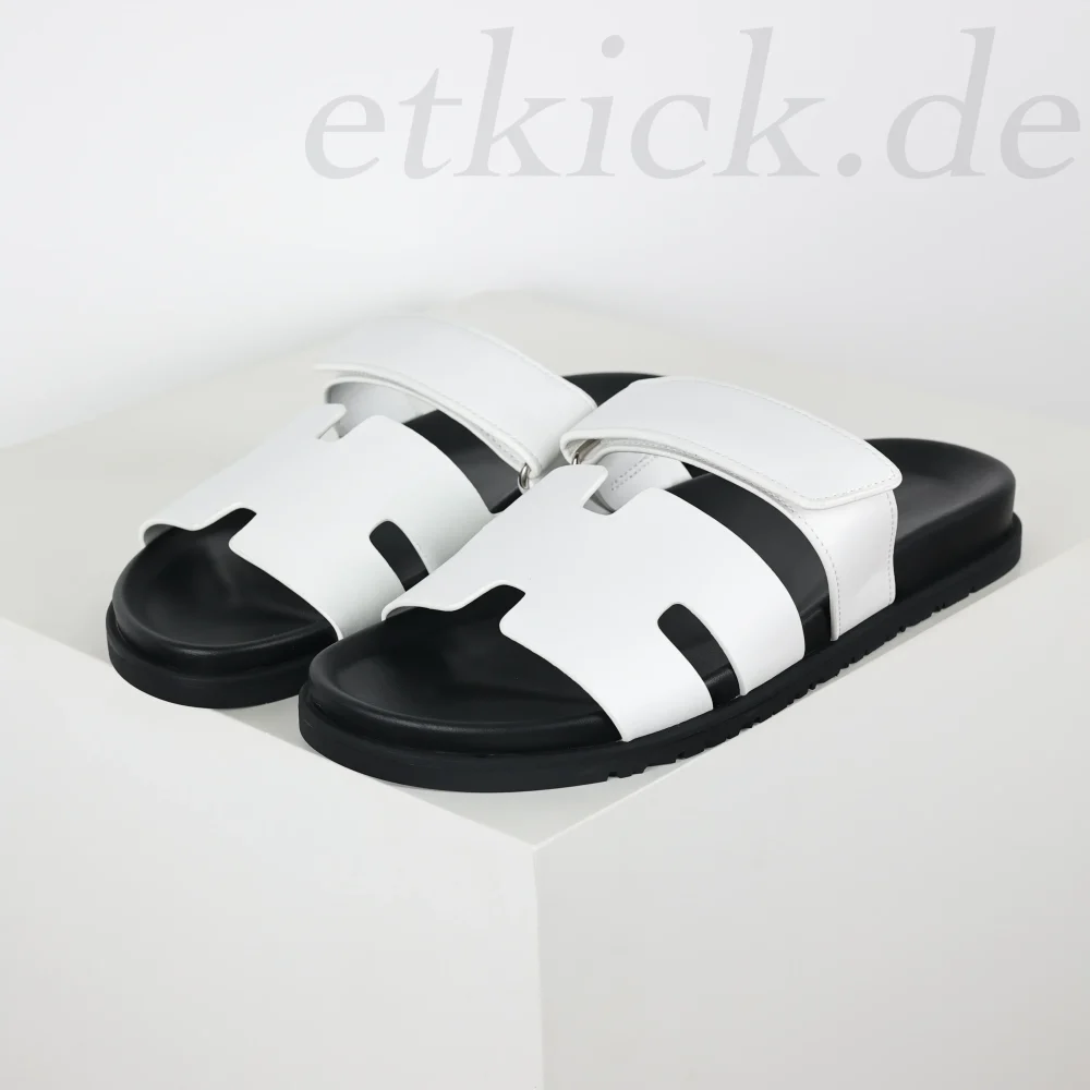 Flache Flip-Flops Sandalen Leder weiß und schwarz