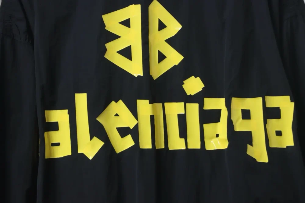 Balenciaga BLCG Jacke mit Stehkragen und gelbem Band – Bild 5