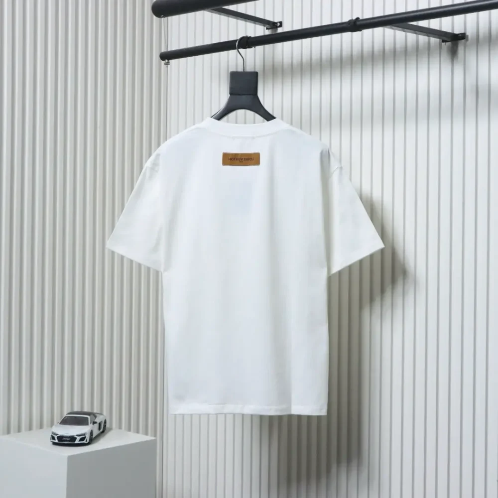Kurzarm-T-Shirt mit Farbetikett an der Schulter – Bild 14