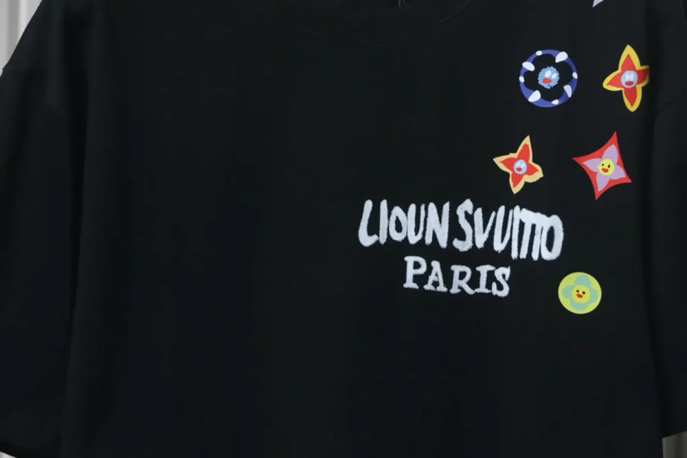 Kurzarm-T-Shirt mit Farbetikett an der Schulter – Bild 5