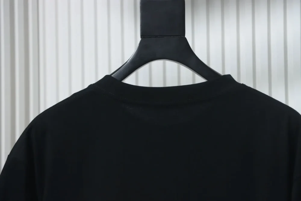 Kurzarm-T-Shirt mit Schachbrettmuster – Bild 4