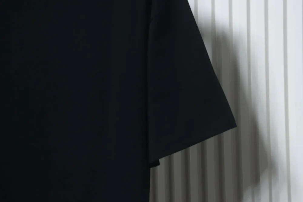 Kurzarm-T-Shirt mit Schachbrettmuster – Bild 8