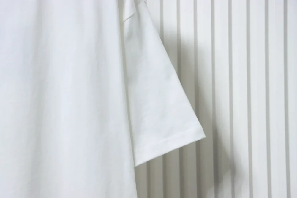 Kurzarm-T-Shirt mit vierblättrigem Kleeblatt – Bild 20