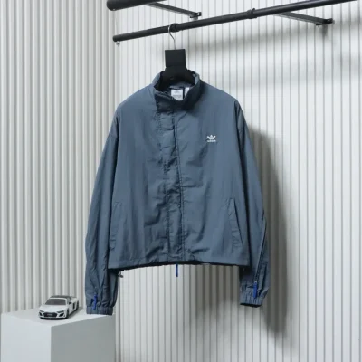 Patchwork-Reißverschlussjacke mit Adidas-Co-Branding und Trefoil-Logo