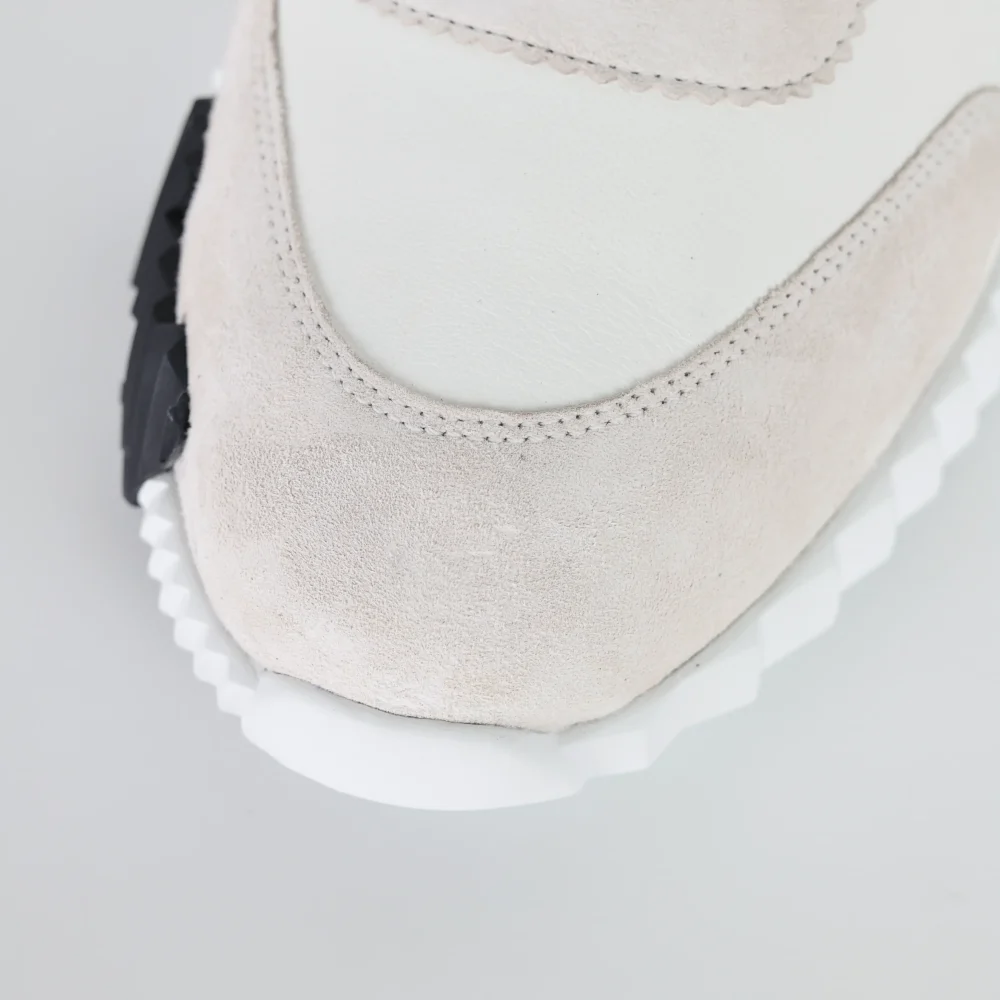 Federnde Low-Top-Sneaker aus Leder in Weiß und Schwarz – Bild 11