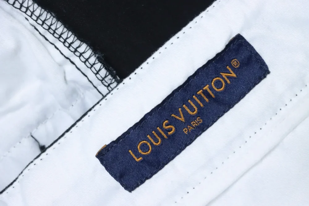 Flared trousers with embroidered lettering back pocket patches – Bild 10
