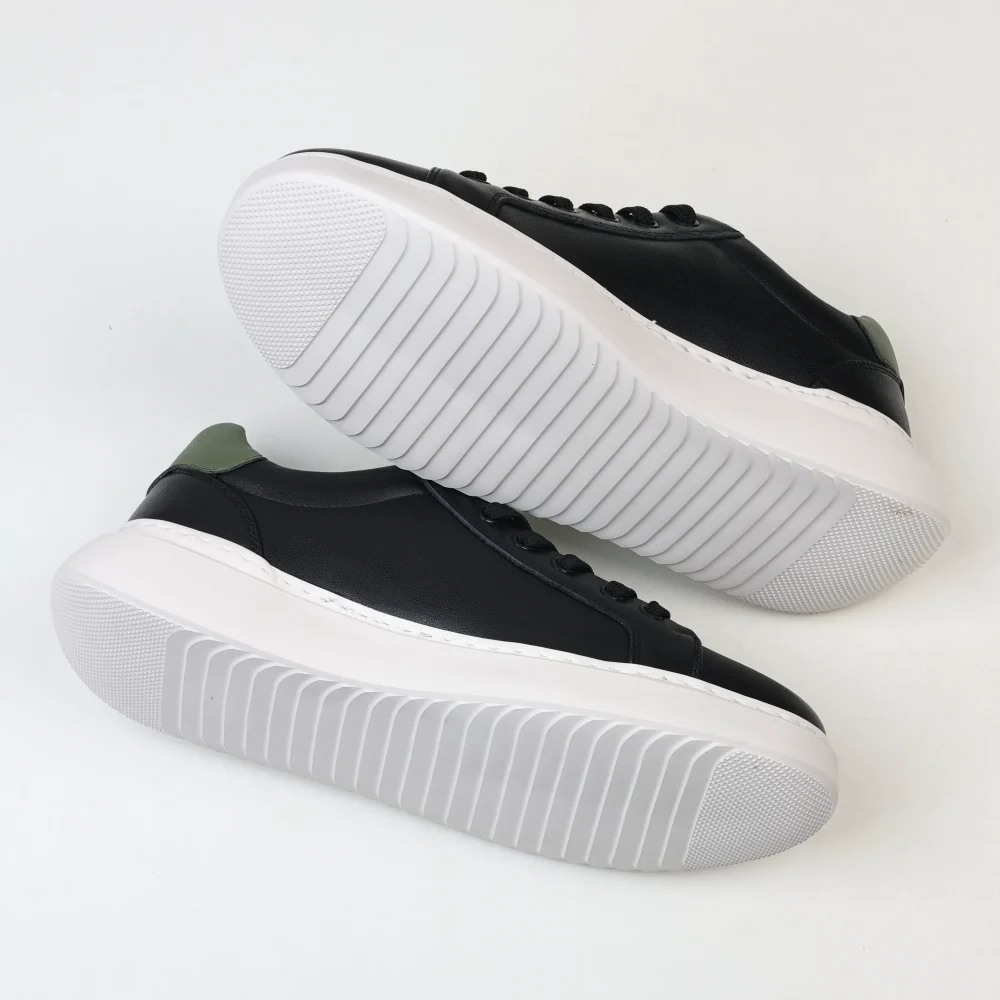 Freizeit-Sportschuhe für Herren in Schwarz, Grün und Weiß – Bild 7