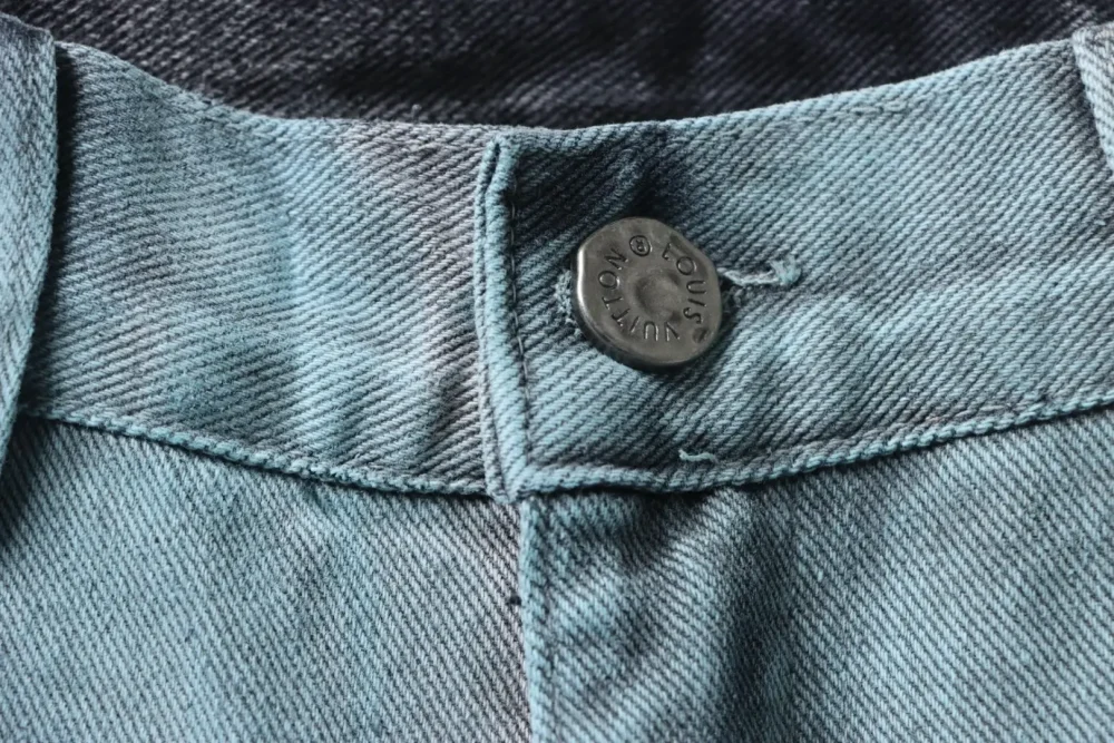 Jeanshose mit Farbverlaufsstickerei – Bild 5