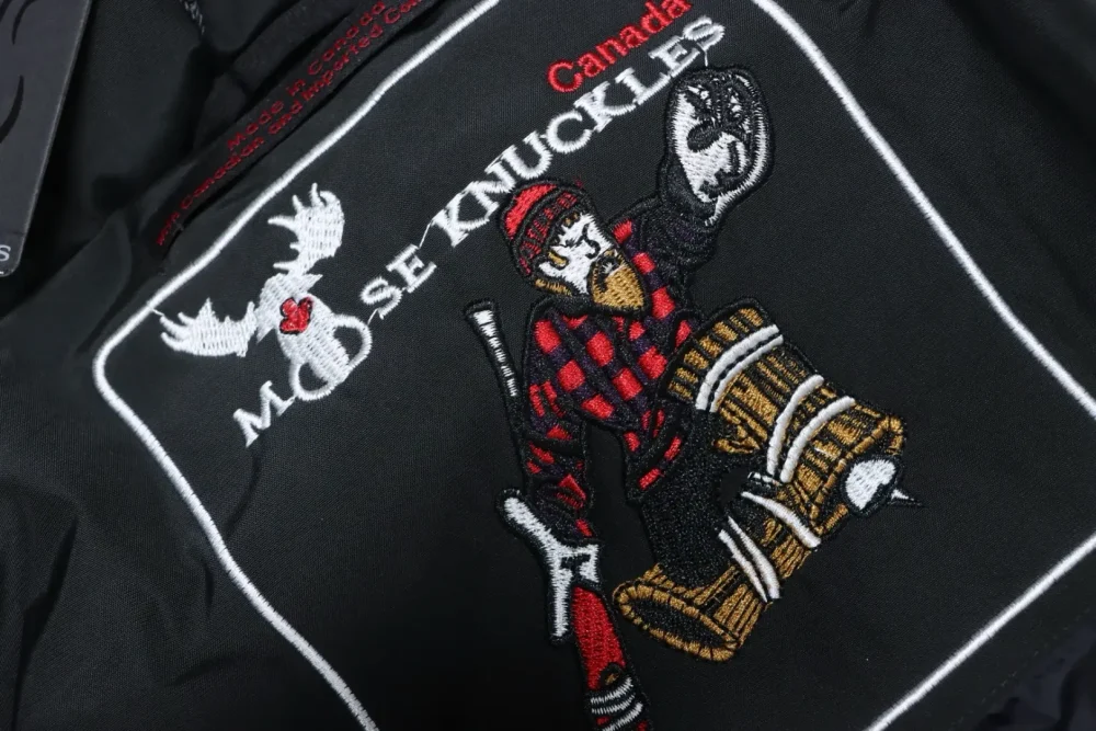 M00seknuck1esstir1ing klassische lange Daunenjacke – Bild 15