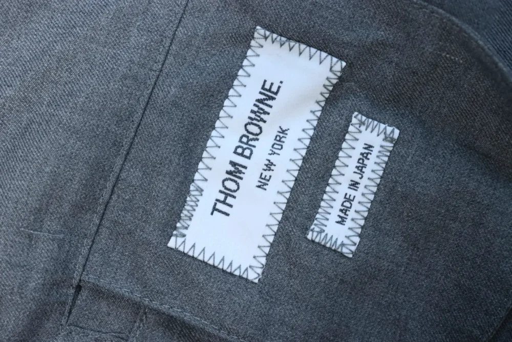 Thom Browne Windjacke mit garngefärbtem Vier-Riegel-Reißverschluss – Bild 10
