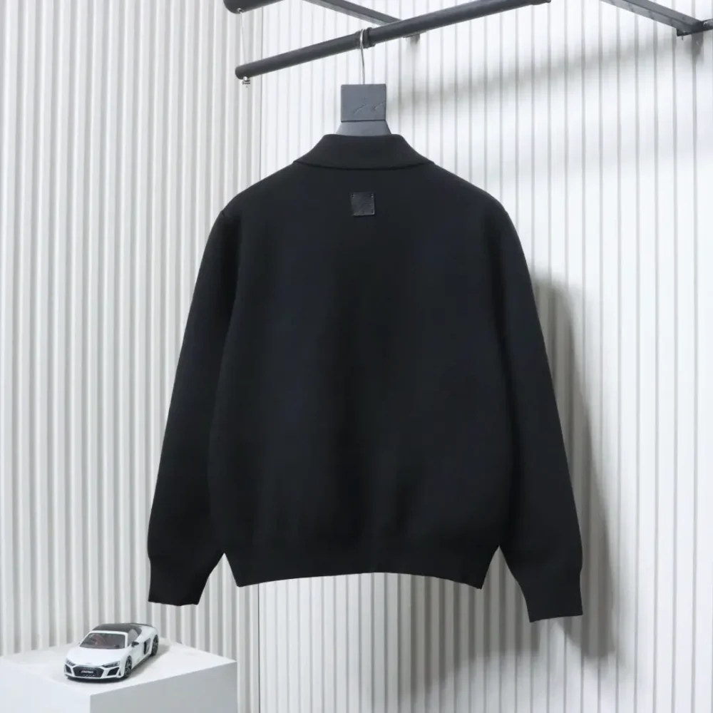 Schwarze Lederjacke mit gestrickter Taille – Bild 2