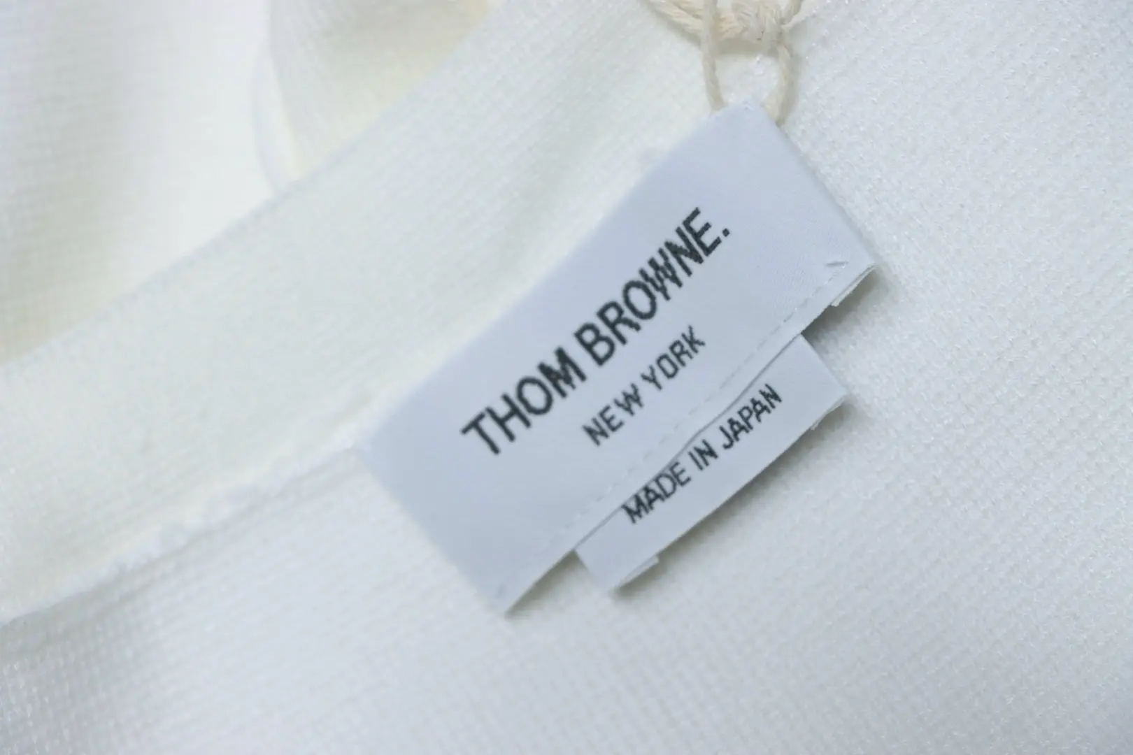 Tom Brown Wollstrickjacke, vorne kürzer und hinten länger – Bild 10