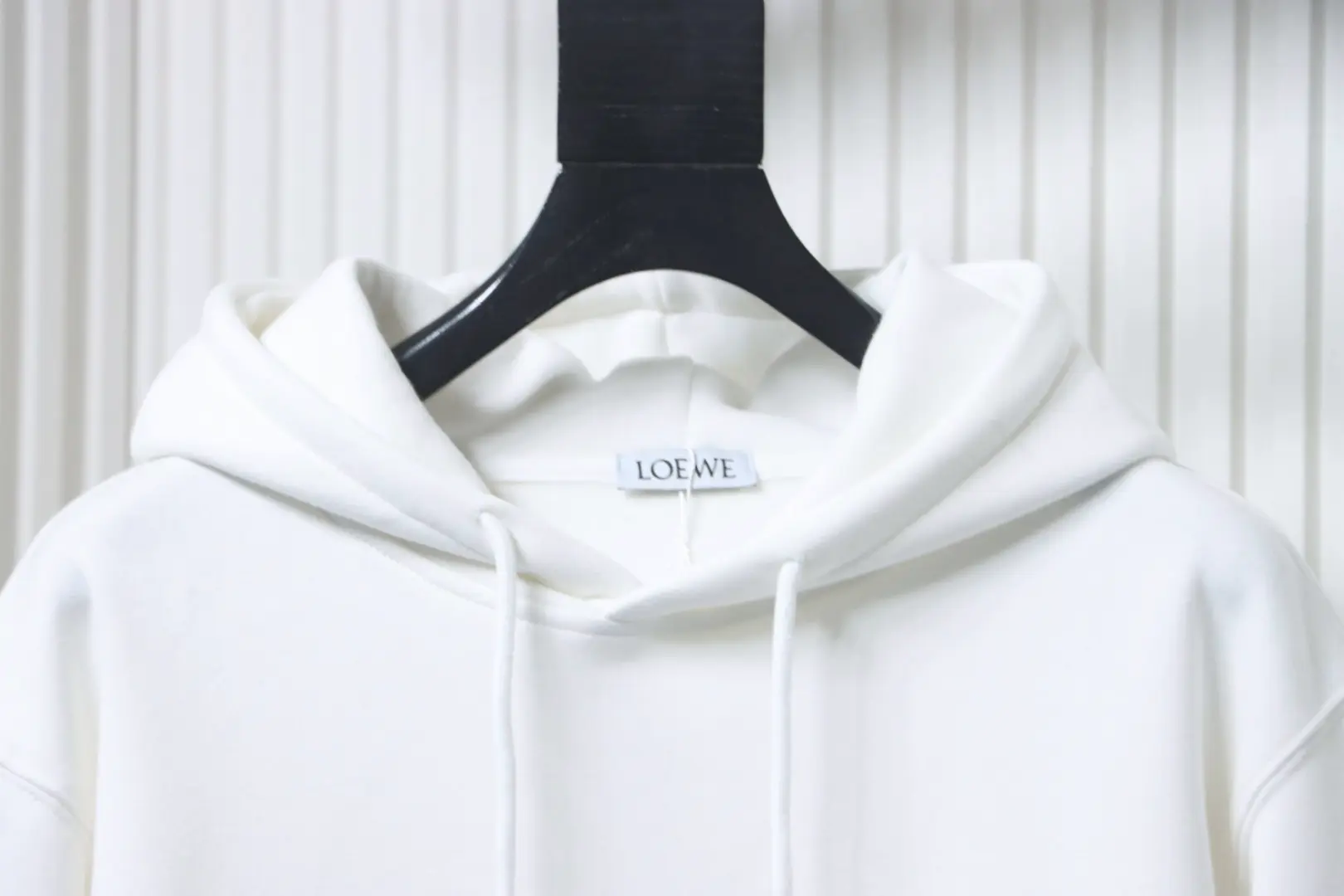 Hoodie mit kleinem Logoaufdruck – Bild 3