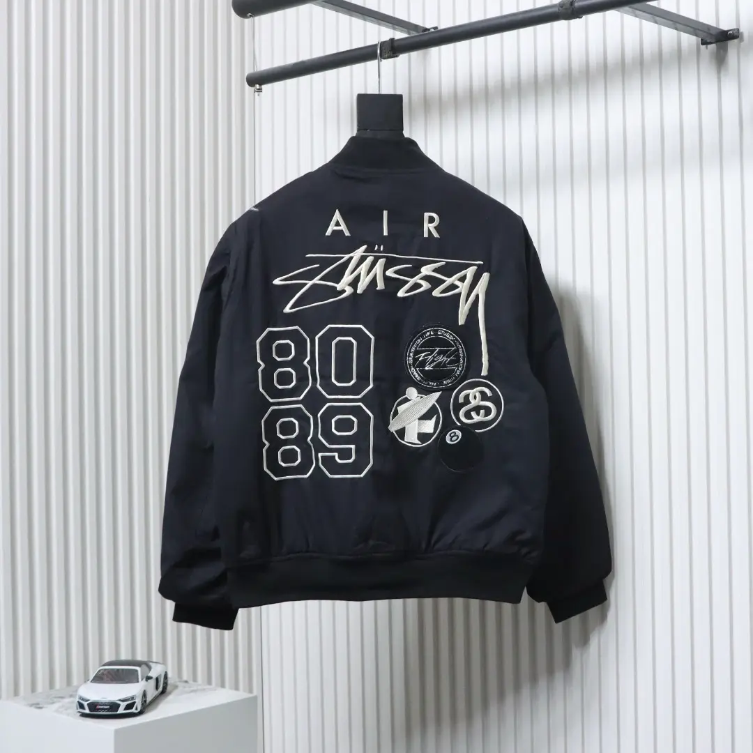 Nike x Stussy FW23 Logo-bestickte Wendejacke