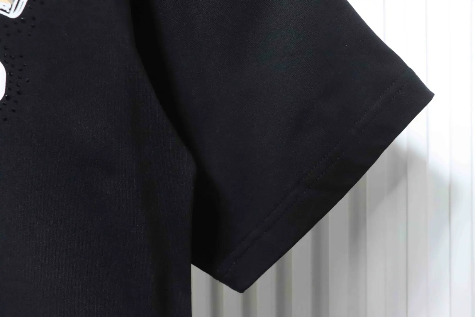 Kurzarm mit Strasssteinen und Hufeisenmuster – Bild 6