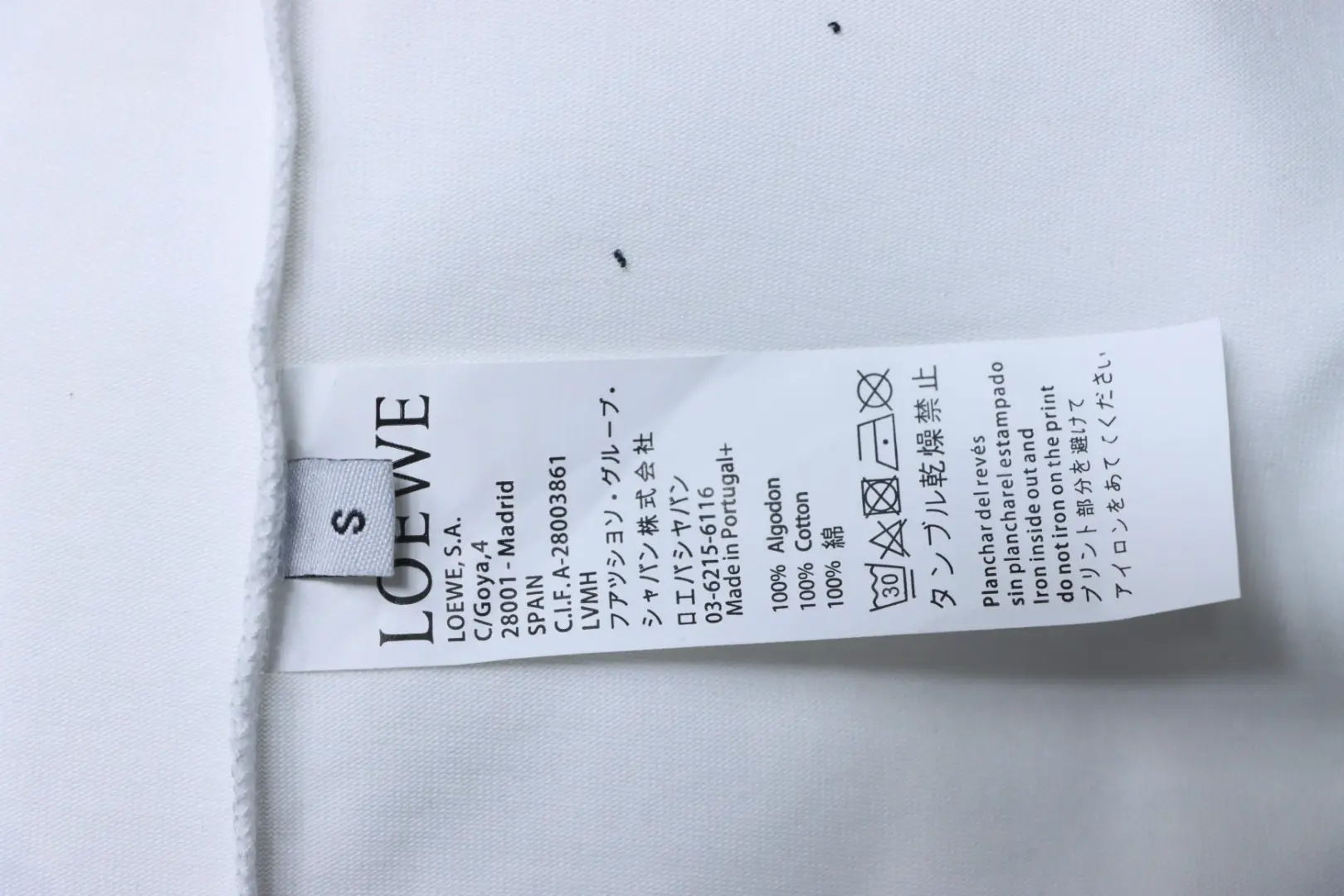 Kurzarm-T-Shirt mit unregelmäßigem, farblich abgesetztem Logo-Schaumdruck – Bild 12