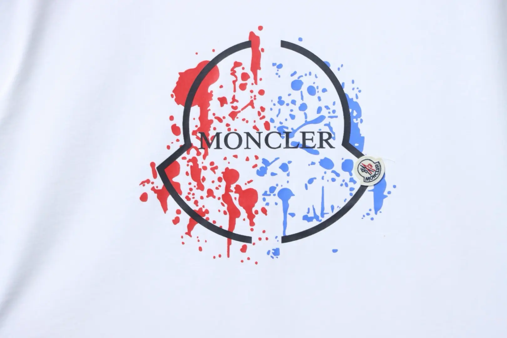 Moncler Kurzarm-T-Shirt mit buntem Splatter-Logo – Bild 7