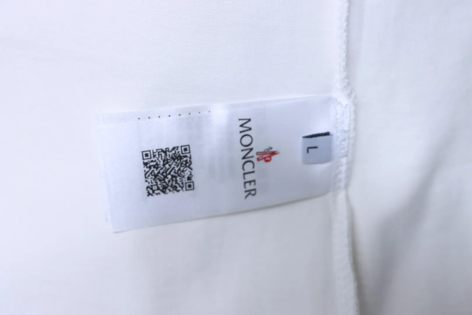 Moncler-Pflegeetikett
