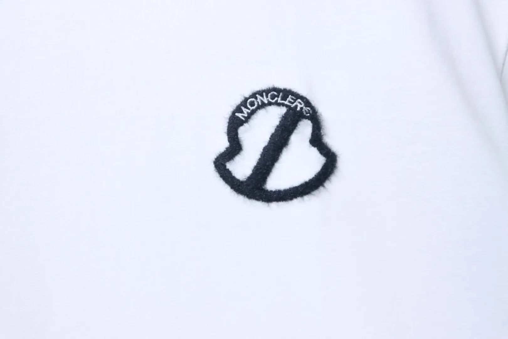 Moncler Markenlogo