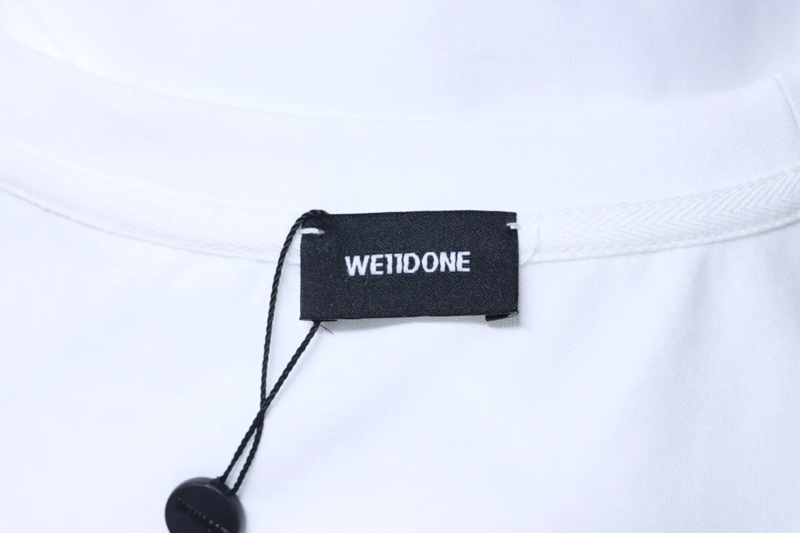 WE11DONE Markenlabel