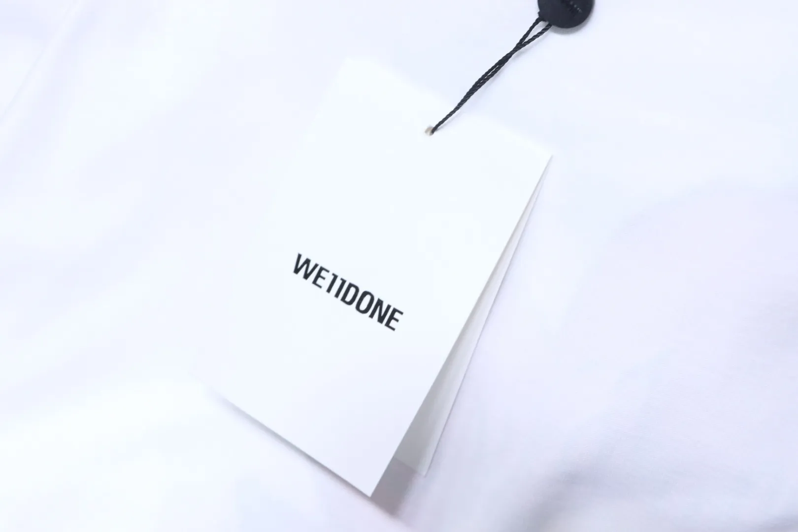 WE11DONE Hangtag