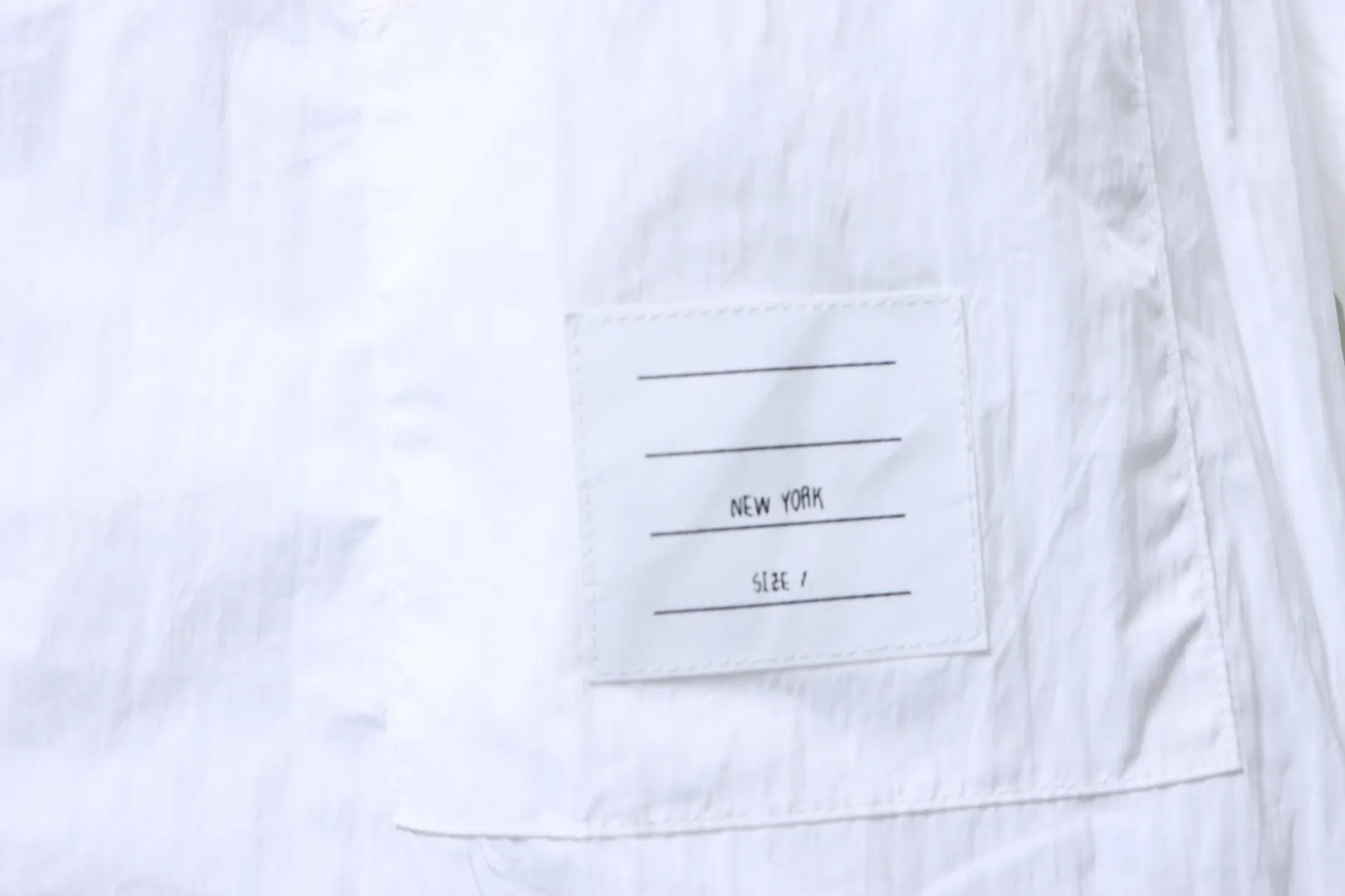THOM BROWNE Hangtag