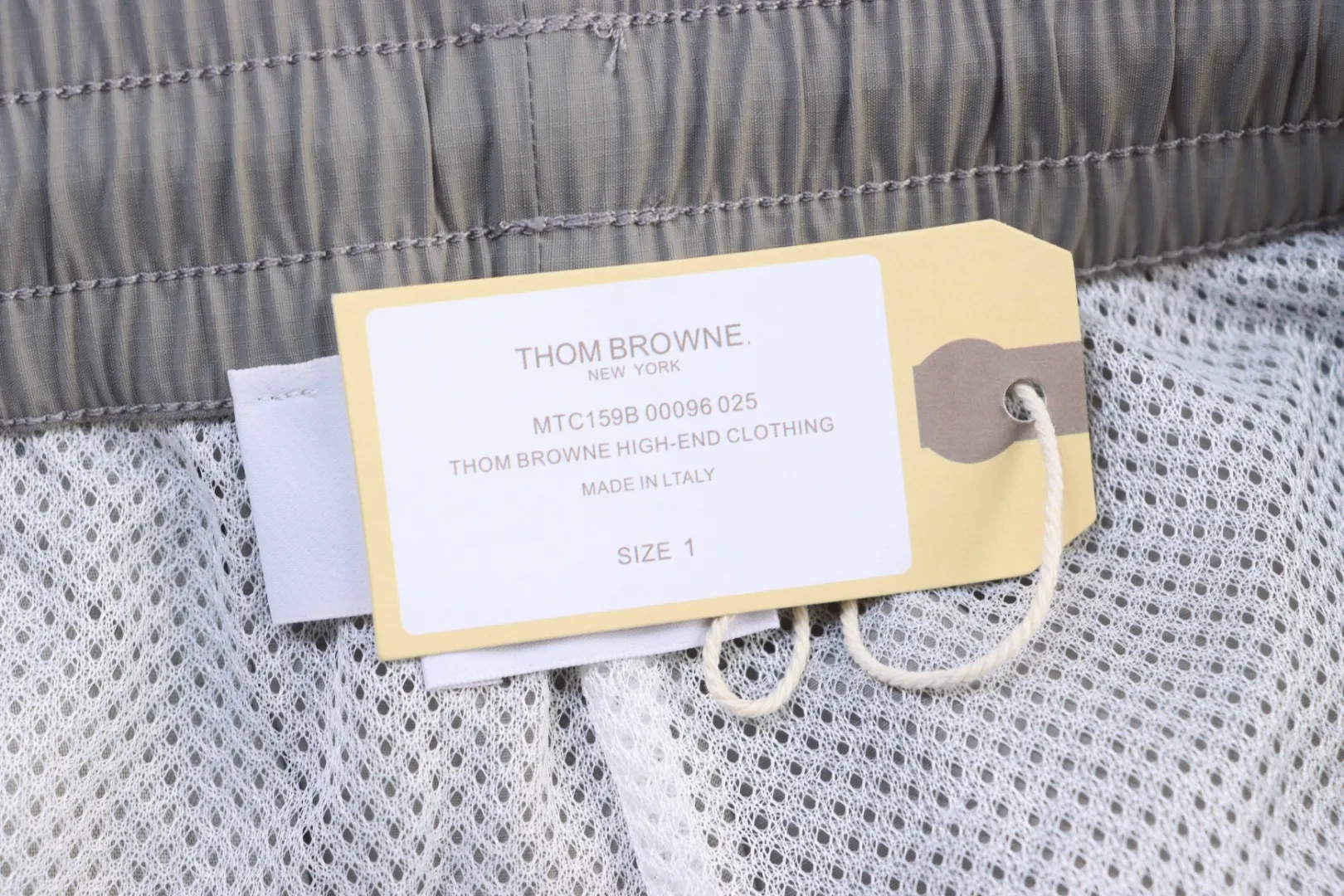 Thom Browne, Hangtag