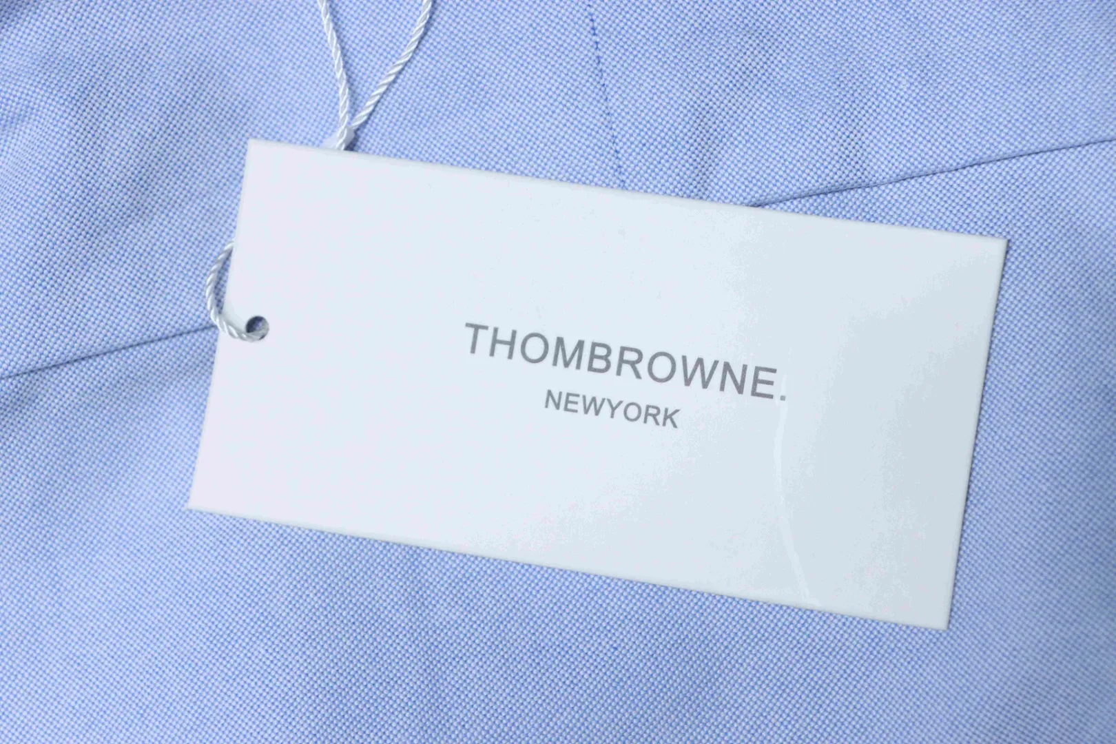 Thom Browne, Hangtag