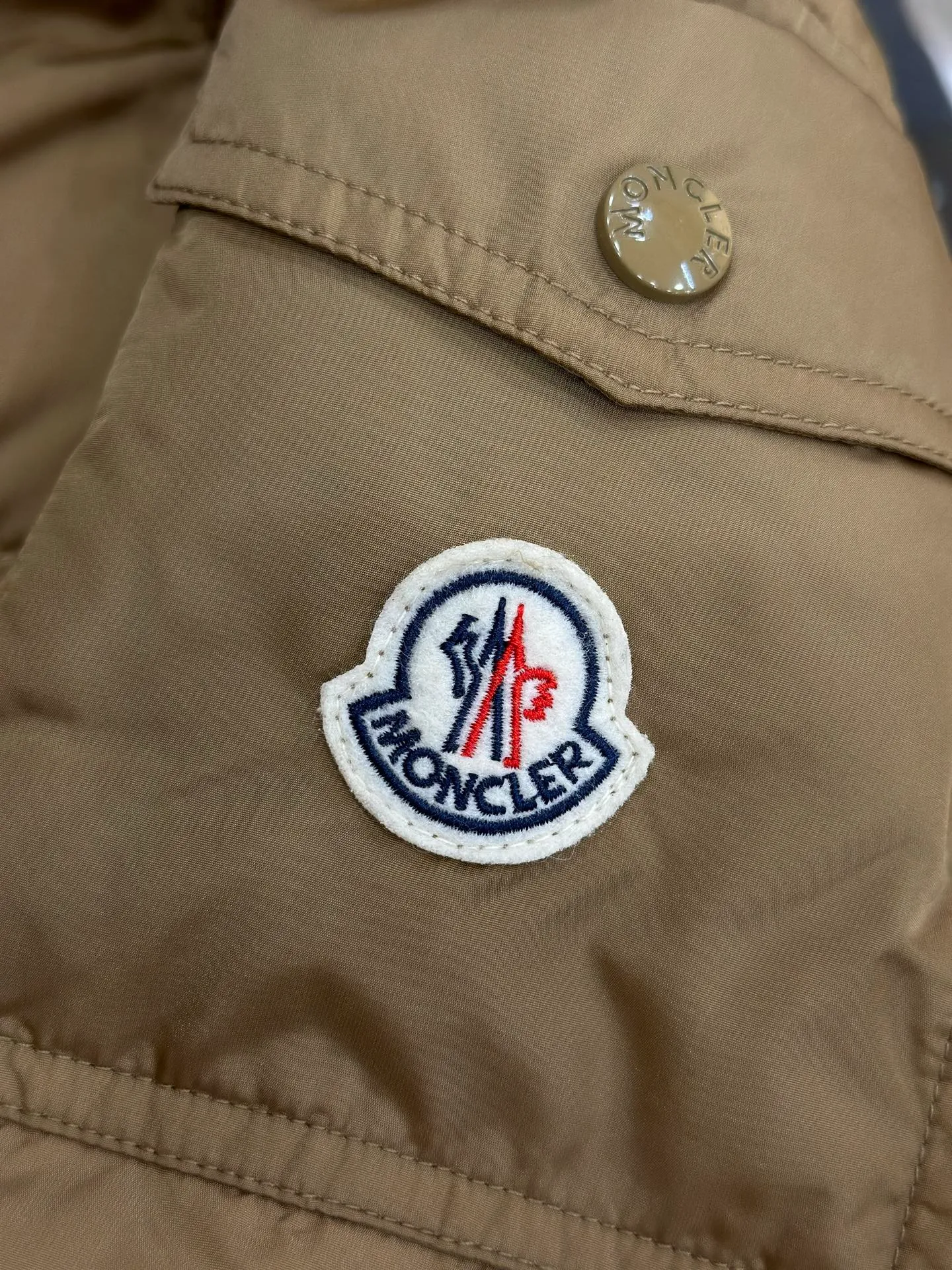 Moncler Markenlogo