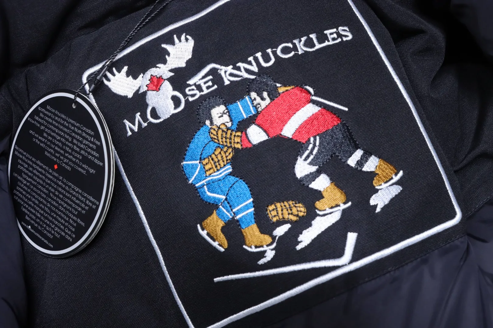 Moose Knuckles – Hangtag