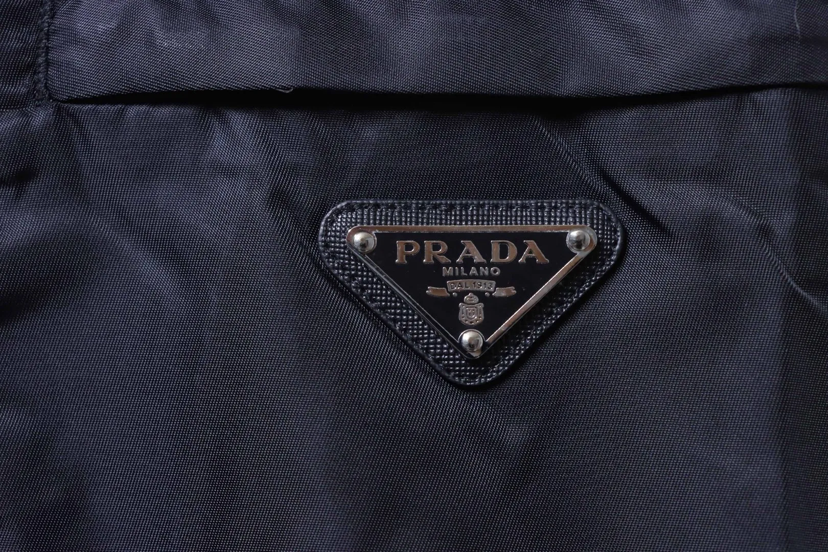 Prada-Dreieck-Logo