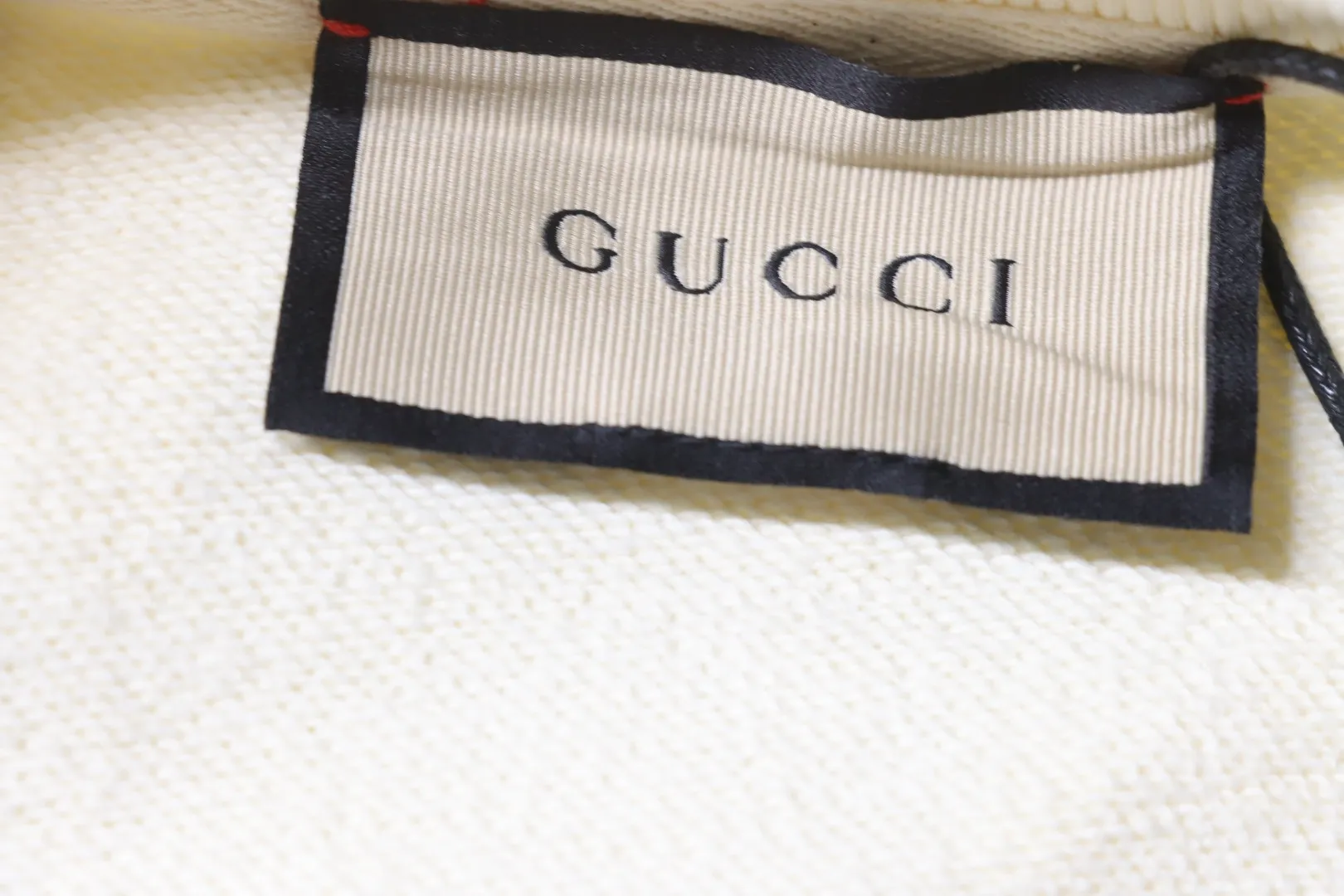 Gucci-Markenetikett
