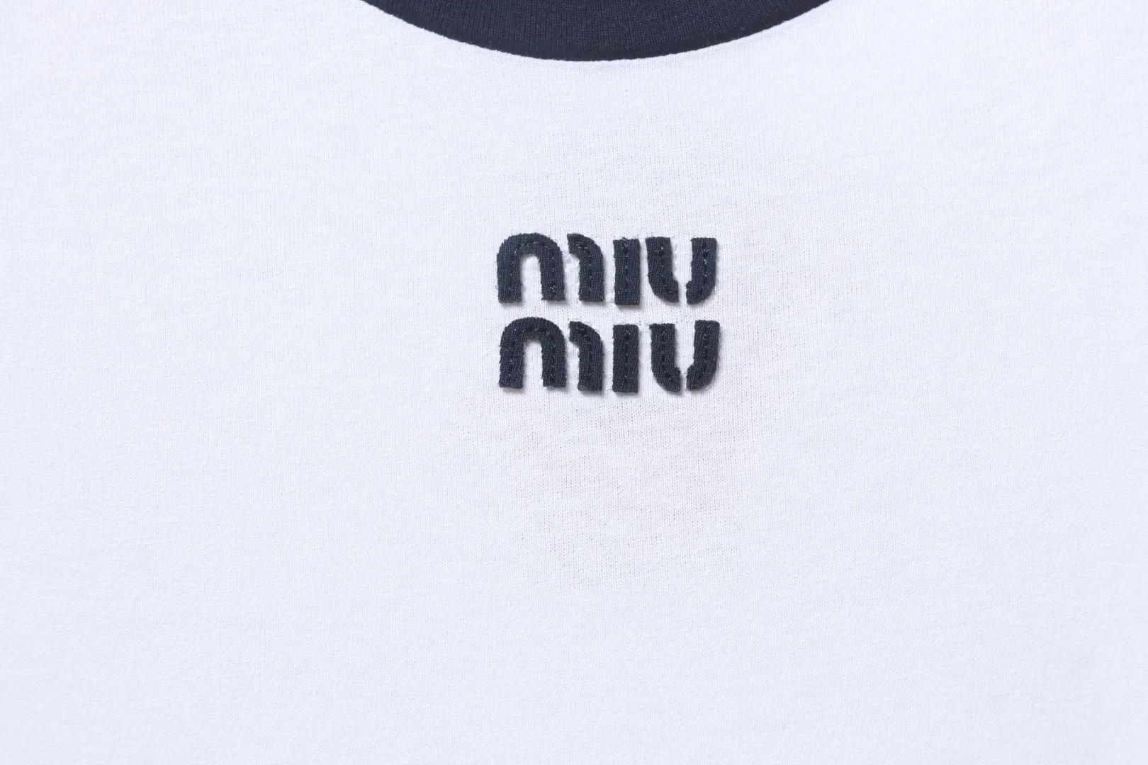 Miumiu Markenlogo
