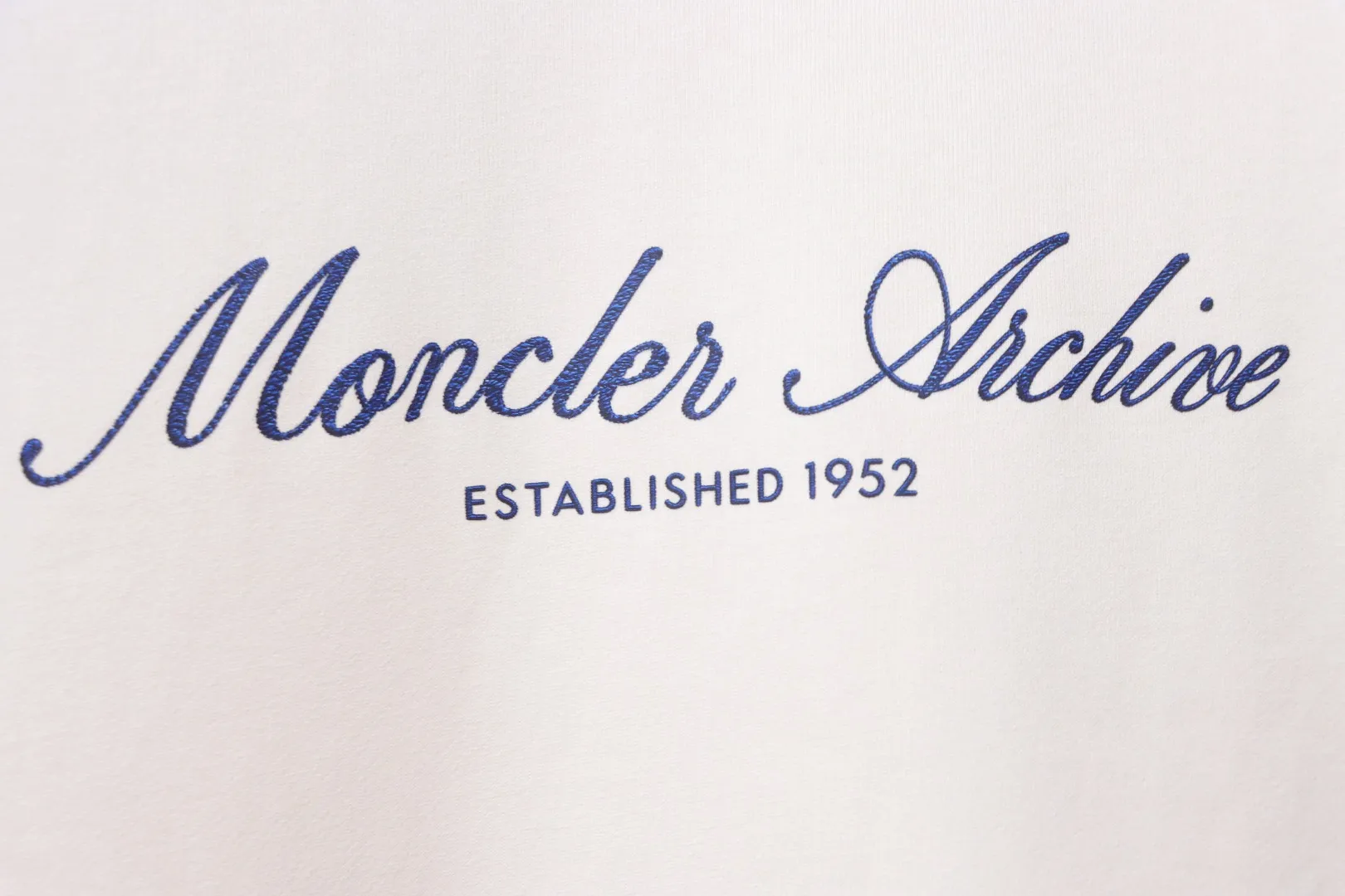 Moncler-Markenlogo